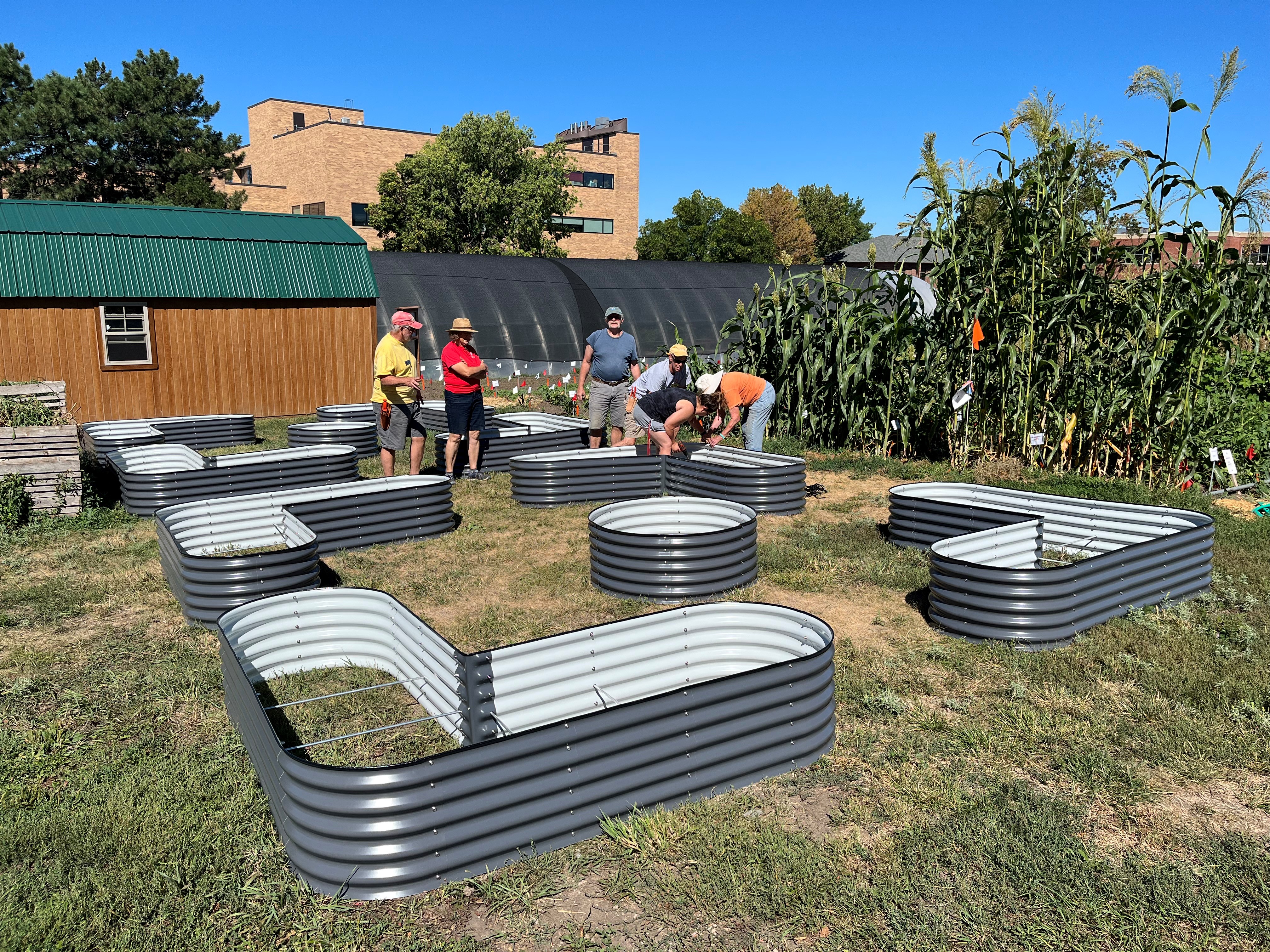 NE-EMGVs volunteering in a community garden